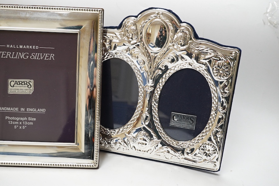 A modern boxed Carr's of Sheffield, silver mounted double photograph frame, width 18.3cm, together with two other silver mounted photograph frames and an Italian silver plated frame. Condition - good